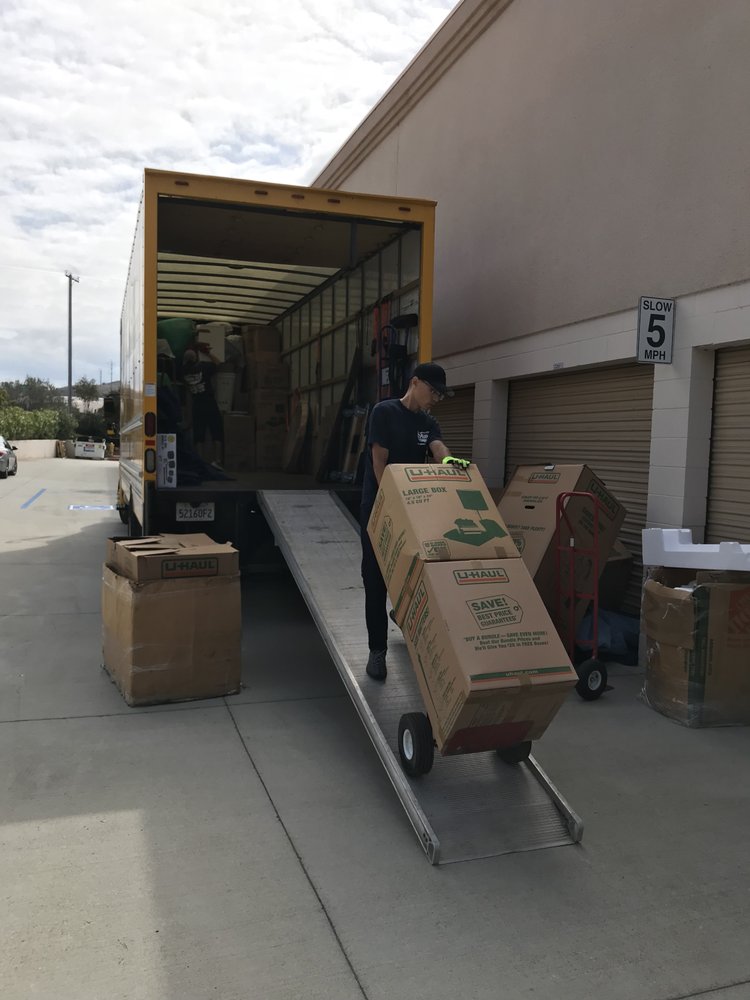 Aid-U Moving Company Team Loading items into the truck